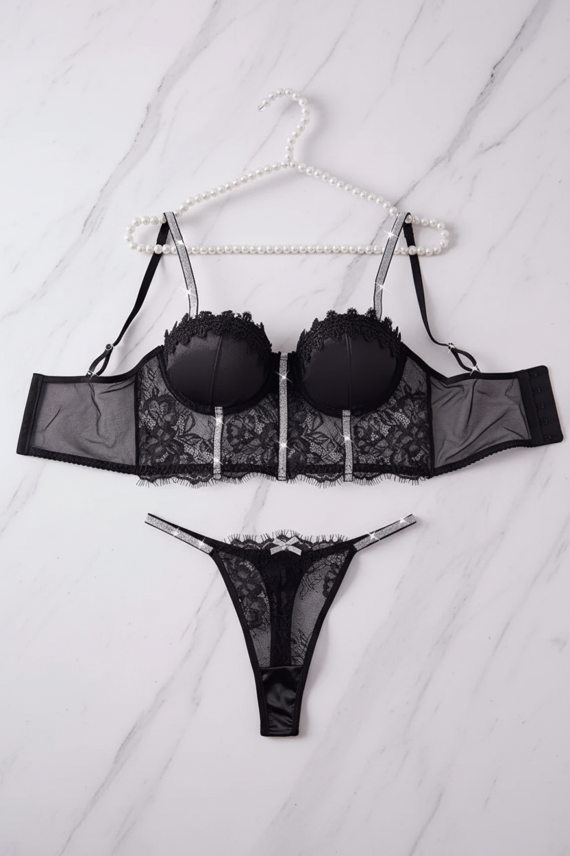 Black lace lingerie set hanging, no props